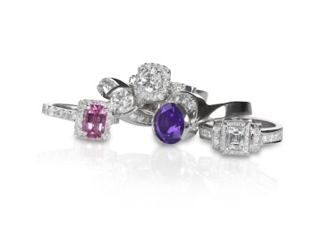 Cluster grouping stack of diamond wedding engagment rings with colored diamonds and gemstones